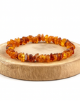 BRACCIALE SCAGLIE IN AMBRA ELASTICO - Energia e protezione - Adulto e bambino | Scopri su Clorophilla Shop