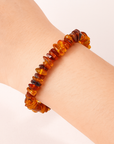 BRACCIALE SCAGLIE IN AMBRA ELASTICO - Energia e protezione - Adulto e bambino | Scopri su Clorophilla Shop
