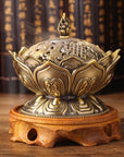 Bruciaincenso Fiore di Loto con simboli Buon Auspicio Tibetani - Bronzo | Scopri su Clorophilla Shop