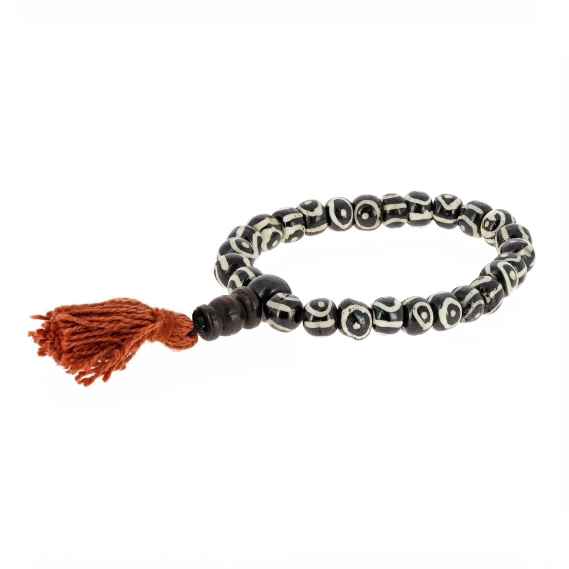 Bracciale in osso con simboli e Nappa | Scopri su Clorophilla Shop
