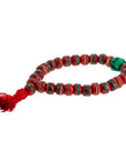 Bracciale in osso di Yak rosso decorato - Purezza, forza e coraggio - Clorophilla Shop