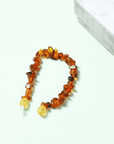 BRACCIALE SCAGLIE IN AMBRA NEONATO/BAMBINO - Energia e protezione - Clorophilla Shop
