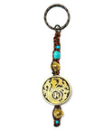 Samsara Portachiavi Tibetano artigianale in Turchese celeste e ottone - Energia positiva e protezione | Scopri su Clorophilla Shop