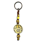 Samsara Portachiavi Tibetano artigianale in Agata Gialla e ottone - Energia positiva e protezione | Scopri su Clorophilla Shop