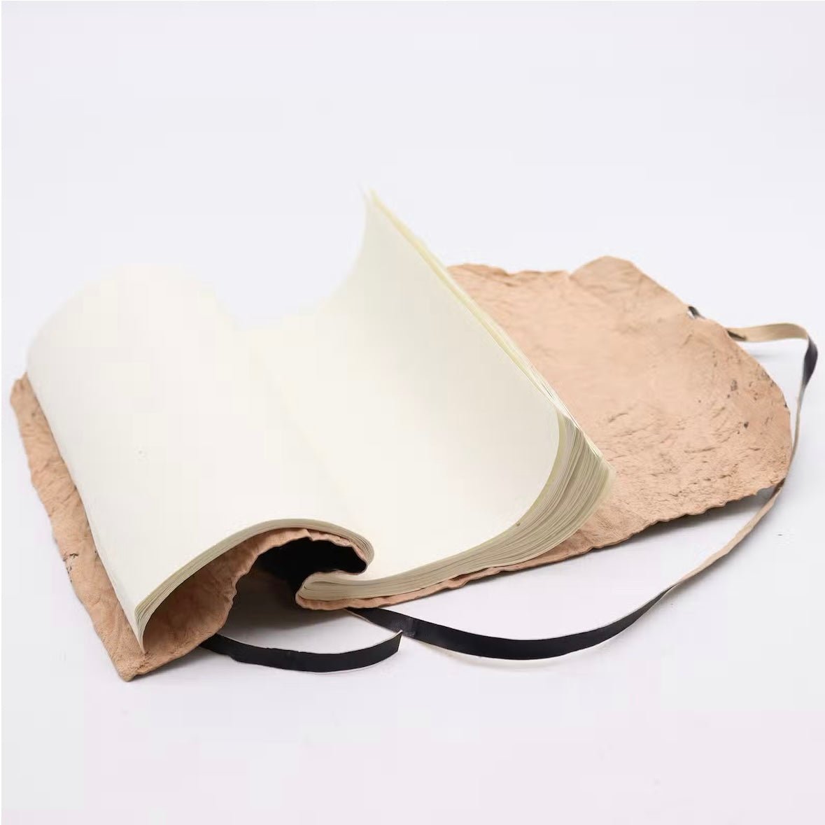TACCUINO DA VIAGGIO IN PELLE ARROTOLATO - 96 pagine - Clorophilla Shop